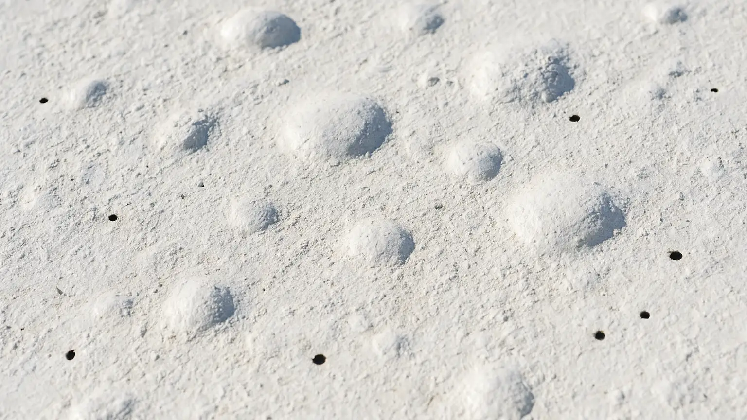 Chalk, Blisters and Pinholes: The Early Tells